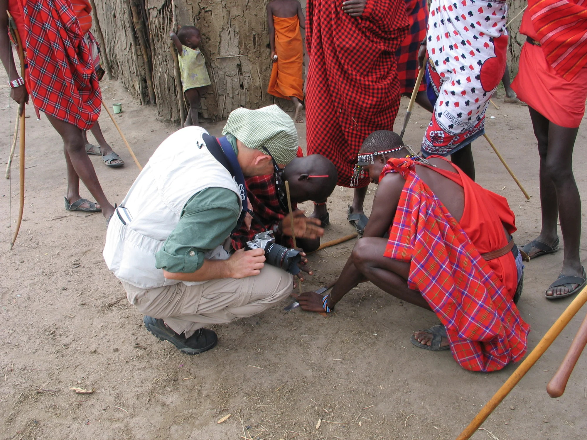 Learning hand drill fire-starting from the Maasai in Kenya